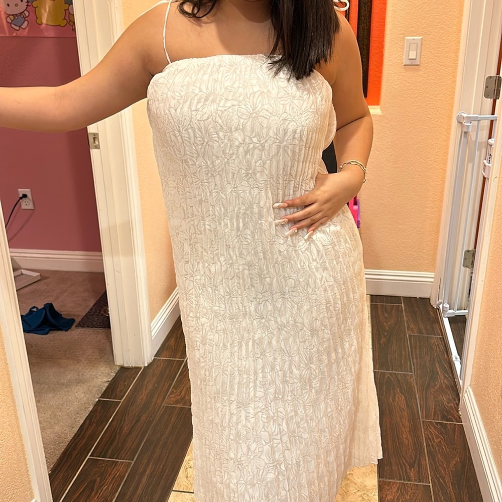 long white dress with flower pattern and ruffled back straps